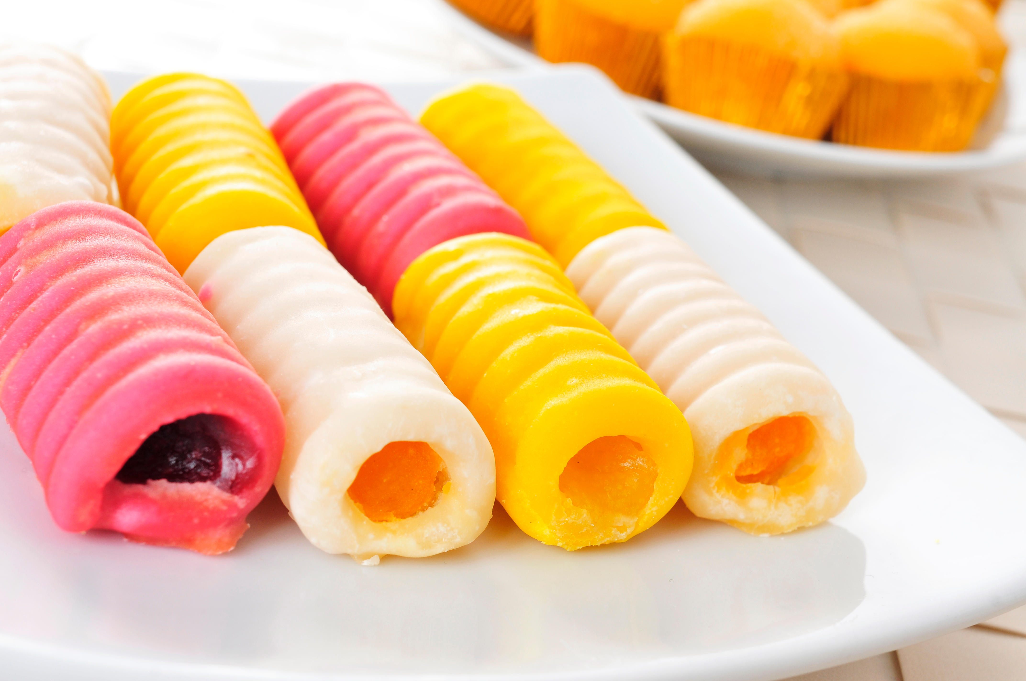 Today, huesos de santo come in an array of colors and flavors.