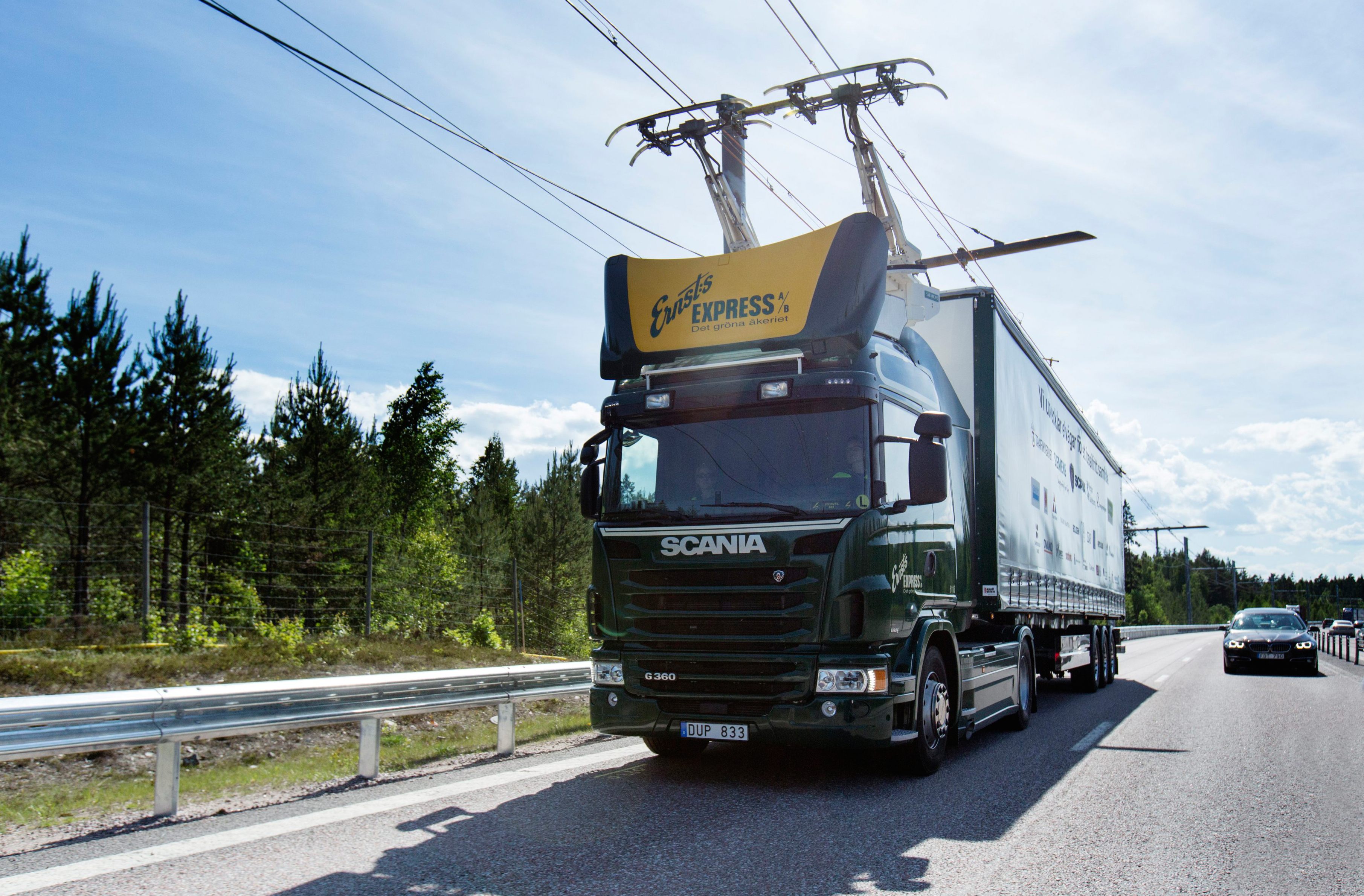 One of two specially outfitted trucks tries out the highway.