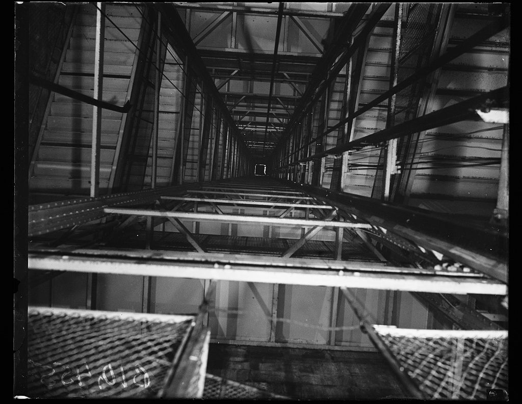 A 1936 photograph down an elevator shaft.