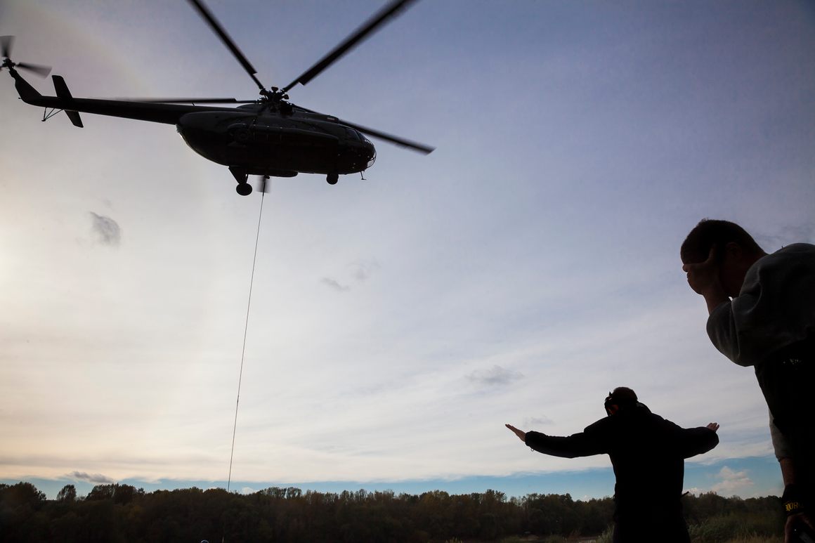 Warsaw Police helicopter helping the expedition to recover the artifacts from the riverbed