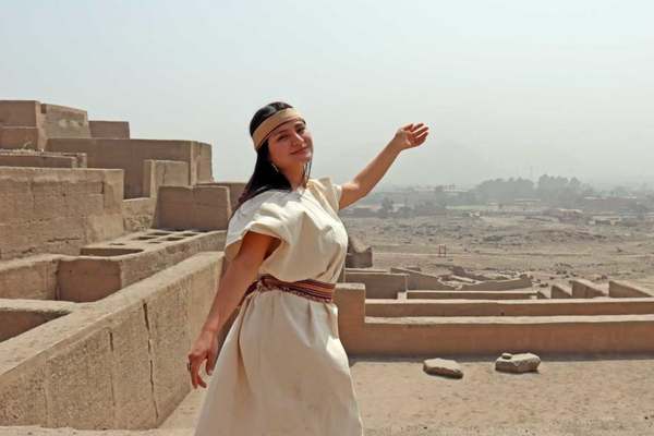 Aracely Solano, a youth volunteer and member of the Huaycán Cultural collective, at the archaeological site.