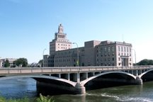 View from the south bank looking north at Mays Island where Cedar Rapids City Hall and Linn County Courthouse are located.
