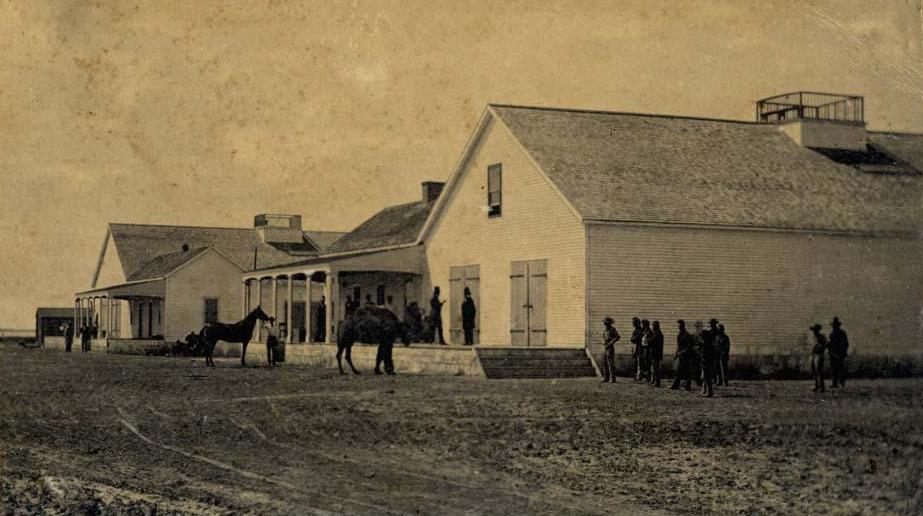 A Camel Corps veteran hangs out near a California barracks in 1863.