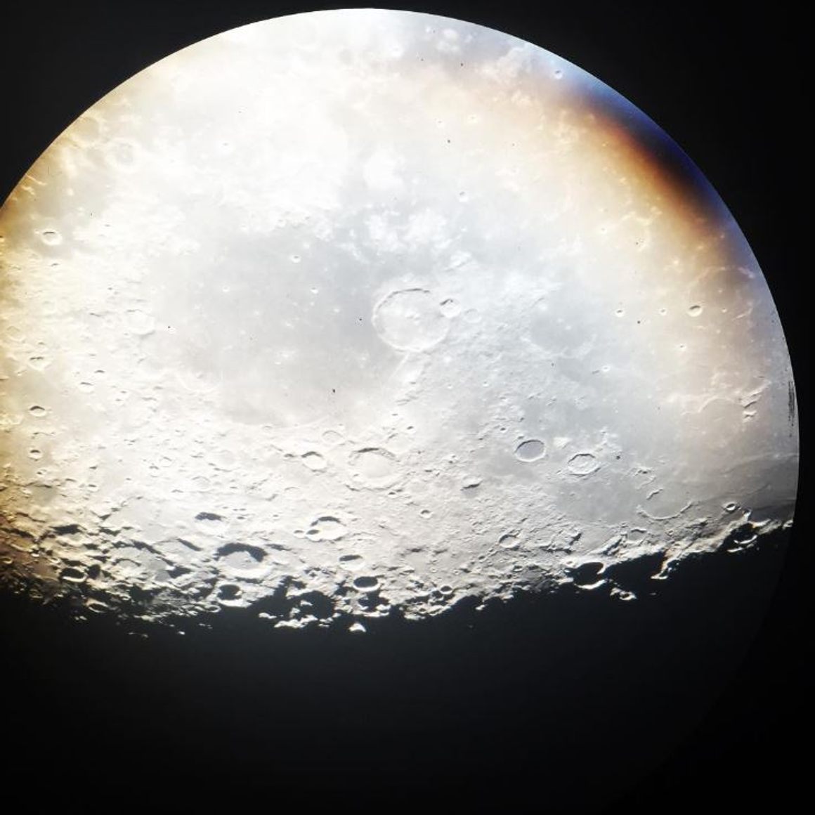 The moon shot with an iPhone through the 60-inch telescope.
