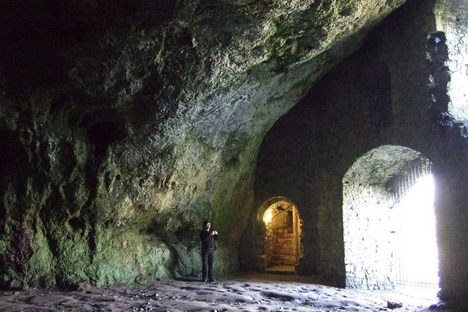 Wogan Cavern showing the entrance stairs and massive Norman-built wall.
