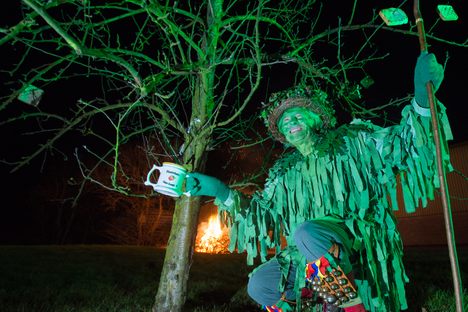 Some revelers dress as the "Green Man," a folkloric figure.