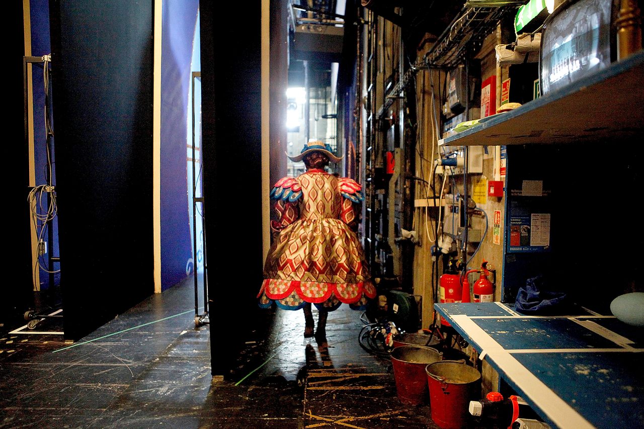 Pantomime Dame Kenneth Alan Taylor walks out onto the stage as Dame Daisy in <em>Jack and the Beanstalk</em> at the Nottingham Playhouse in December 2013.