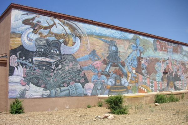 The left side of "Multi-Cultural," a collaborative mural painted in 1980. State officials approved a plan that would destroy the painting.