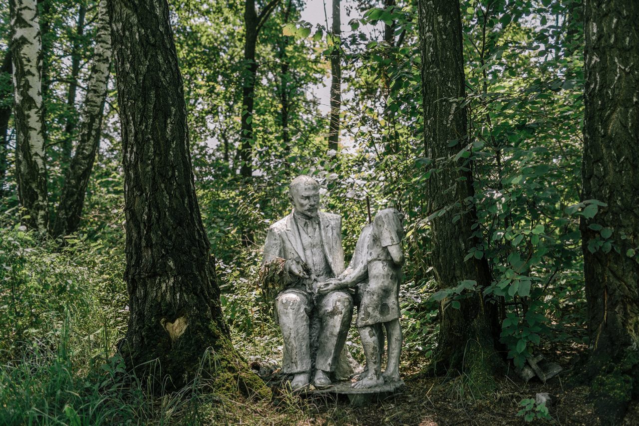 A Lenin monument hidden in a forest. The mayor explained "It’s the last one in the region, and we never know what the next government will be like." Local youths built a table next to it that is now a popular gathering place. Horbani, Kyiv Region, July 2016.