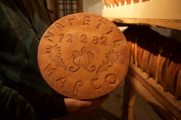 One of Zufferey's engraved wheels of cheese.