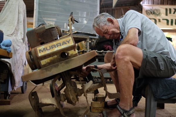 One of the founders of Israel's Tractor Museum, the late Gideon Grosman, restores a small Murray plow. 