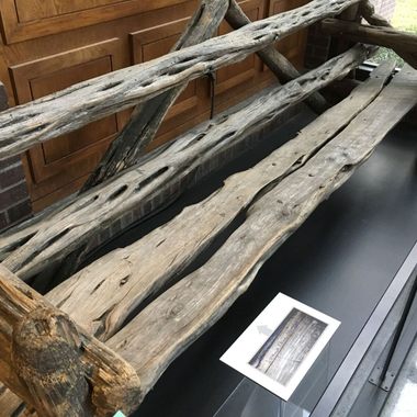 The cedar bench.