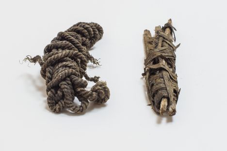 The cord and unfinished longbow found on Ötzi, who was killed in Europe's Ötztal Alps over five millennia ago.