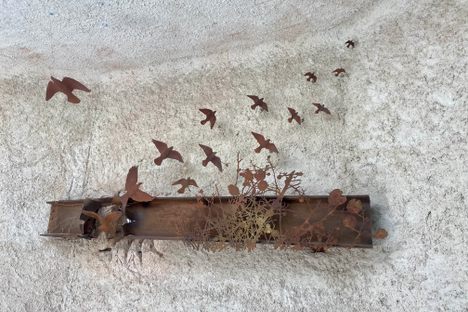 The broken girder was refashioned into a symbol of peace.