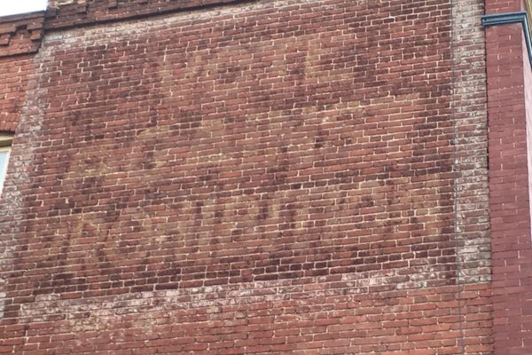 Faded sign.