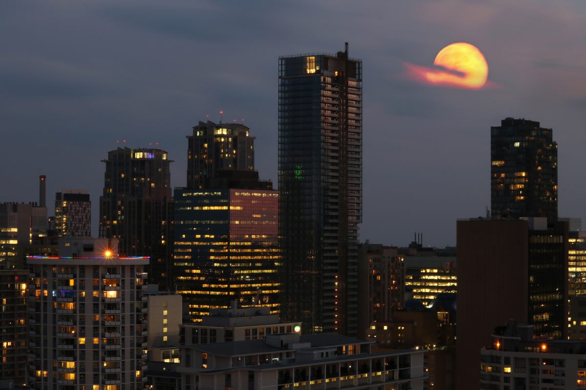 A full moon graces the summer solstice in Toronto. 