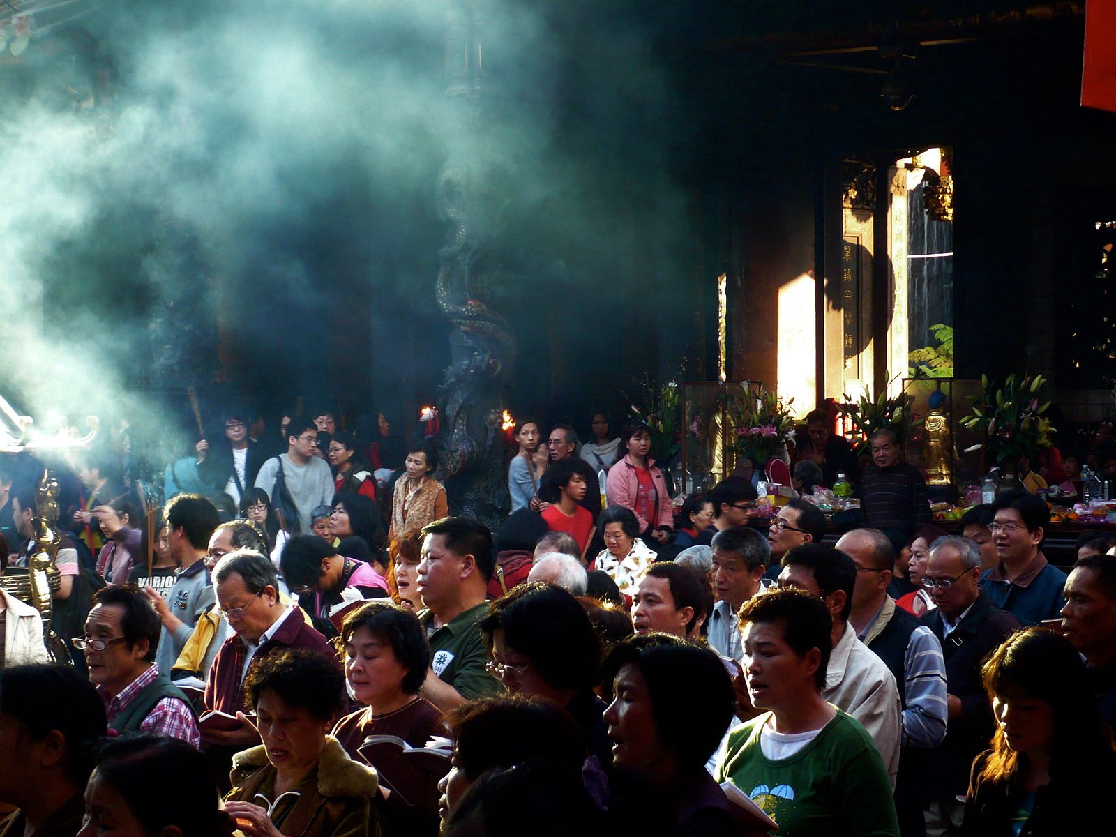 Visitors to Taipei City's Lungshan Temple pray for good luck in the New Year.