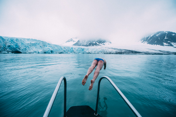 Lewis Pugh dives in for a training swim. 