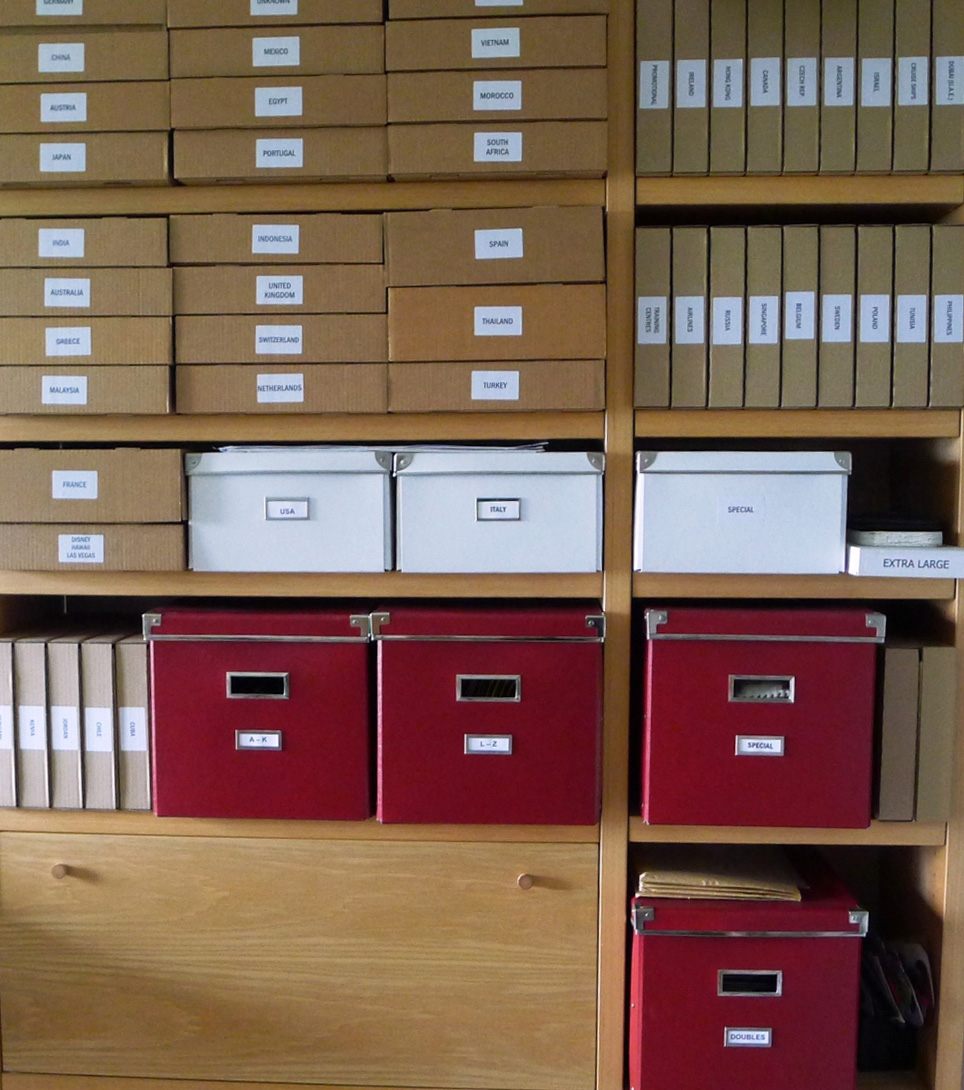 Flores' collection is neatly kept and filed by country.