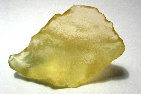 Libyan Desert Glass found in the Great Sand Sea along the border of Libya and Egypt. This specimen weighs 22 grams and is about 55 mm wide.