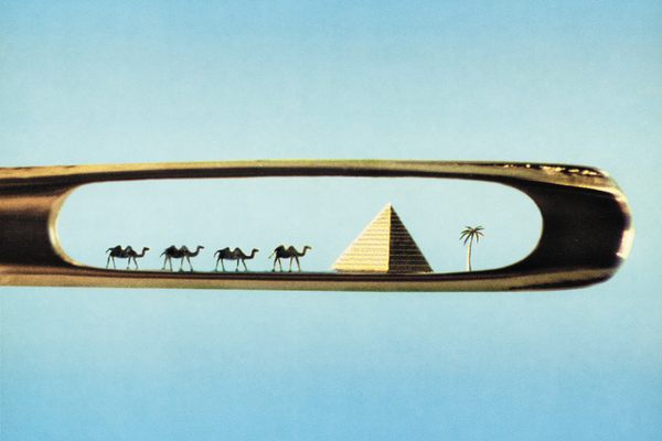Ancient Egyptian scene inside of the head of a needle