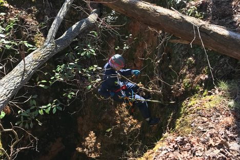 Etchison rappels into yet another mine.