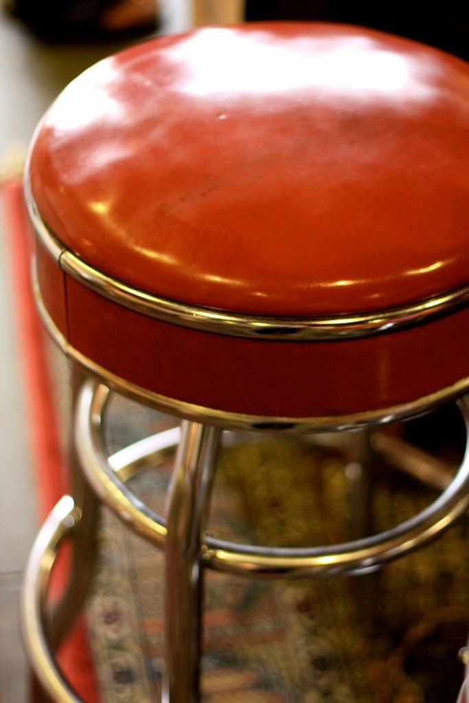 A pleather counter stool. 