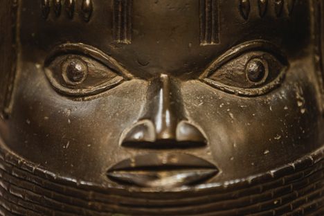 A commemorative head, part of the so-called Benin Bronzes, which were looted from the royal palace in Benin City in 1897. The image was taken in December 2022 in Nigeria's capital, Abuja, when the piece and several other objects were formally repatriated from Germany to their homeland.