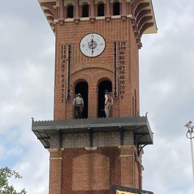 The two cowboys at Grapevine Glockenspiel Tower.