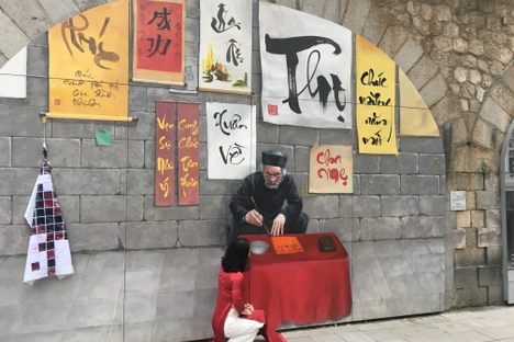 Painted scribe vendor and real-life customer.