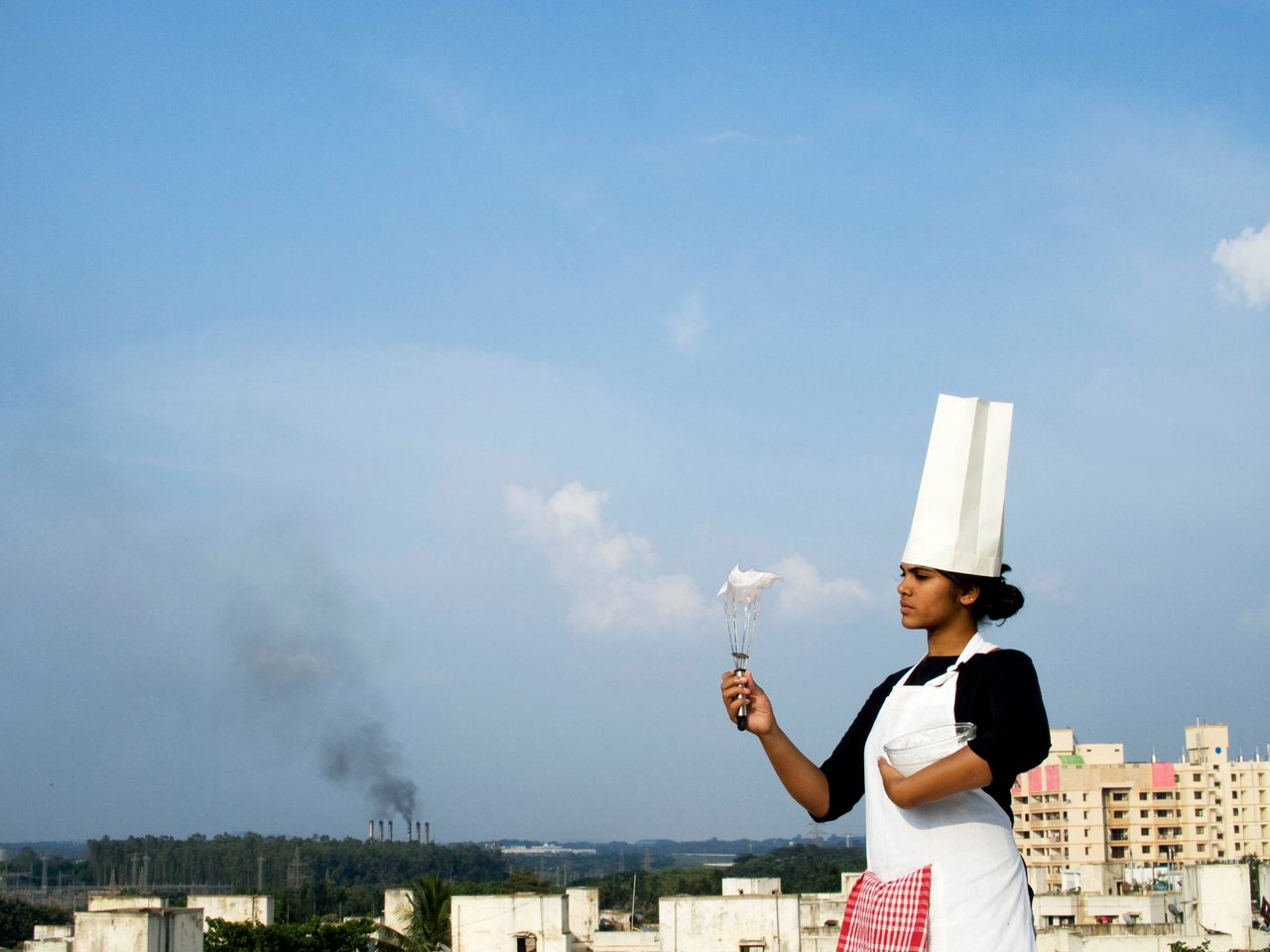 One of Zack Denfield's students whips smog into a meringue in Bangalore, India.