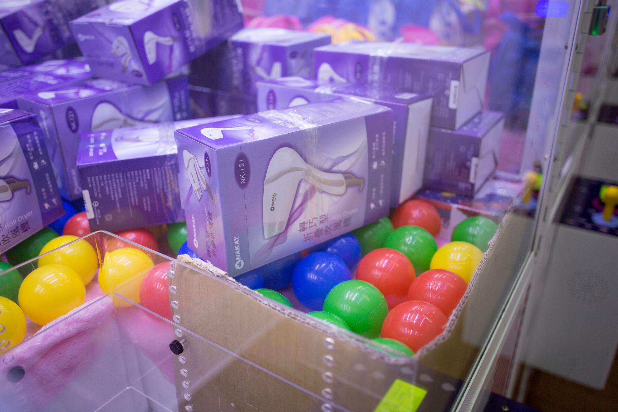 Hair dryers as the prize in a claw machine, seen in the Shida area of Taipei.