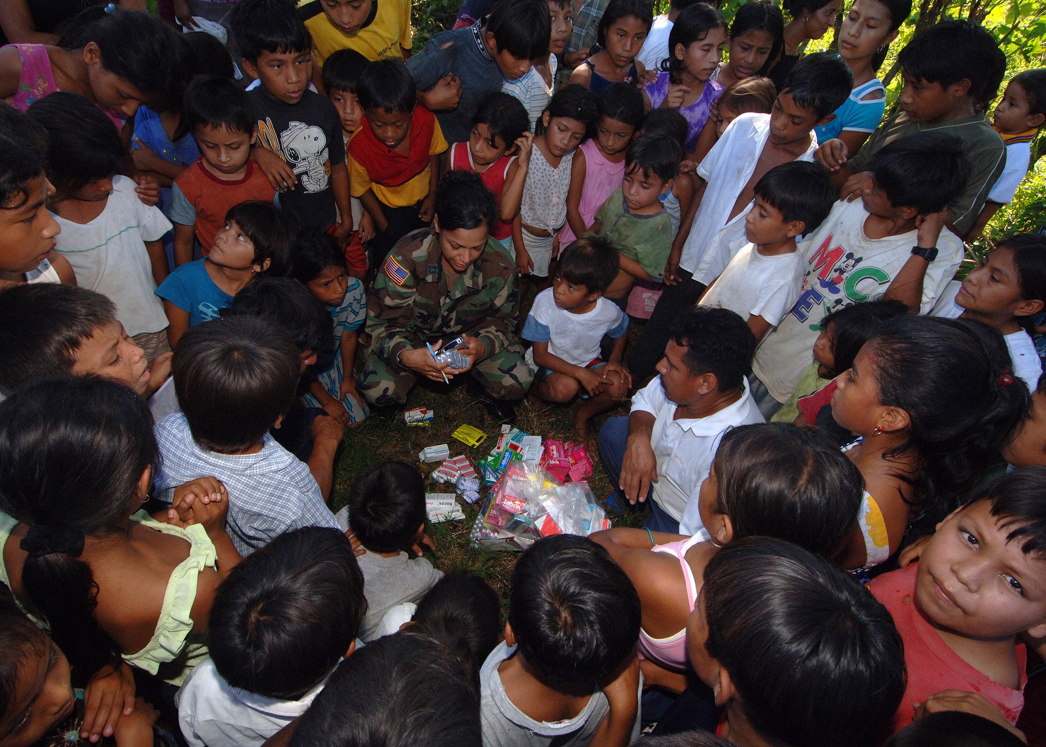 U.S. Army Capt. Daniva Mayes discusses the medicine she is leaving behind with a local physician to help the victims of Hurricane Stan in Guatemala.