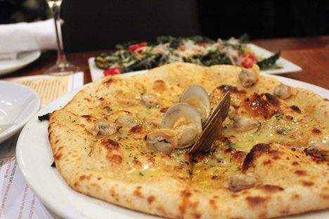 In-shell littleneck clams accentuate this clam pie.