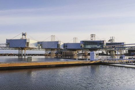 The "pods" suspended over the lake are abandoned today, but once housed exhibitions and restaurants.