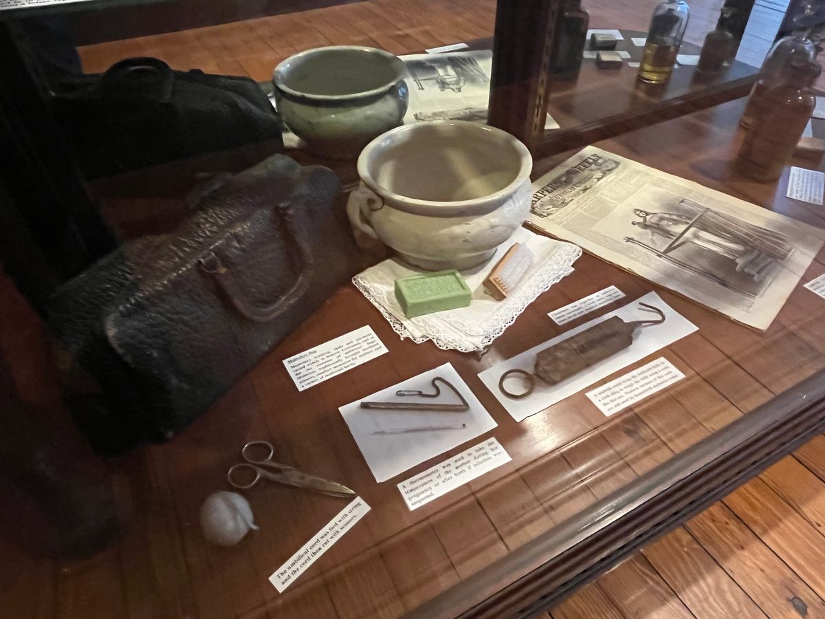 Nineteenth-century midwife tools on display in the Pharmacy Museum of New Orleans.