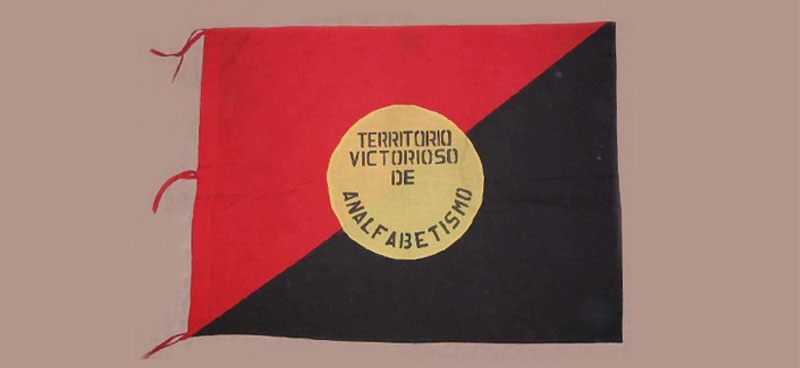 A flag used in the National Literacy Crusade in Nicaragua to indicate places where illiteracy had ended.