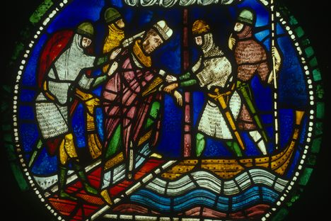St Alphege being carried off by the Vikings.