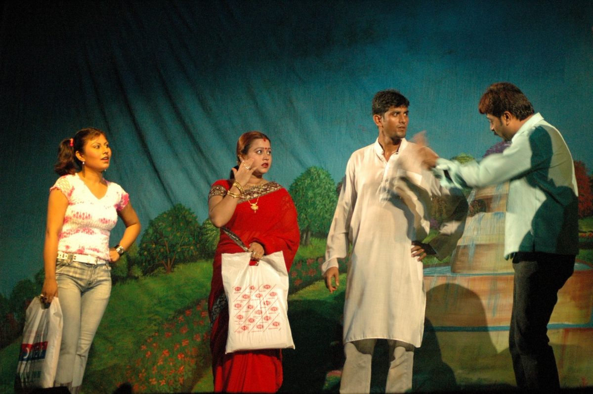 Performers Prastuti Parashar, Aditi Bhuyan, Pranab Sarma, and Mridul Bhuyan on stage. Parashar is now the lead producer of one of the most prominent theaters.