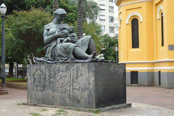 The monument with the backdrop of a church.
