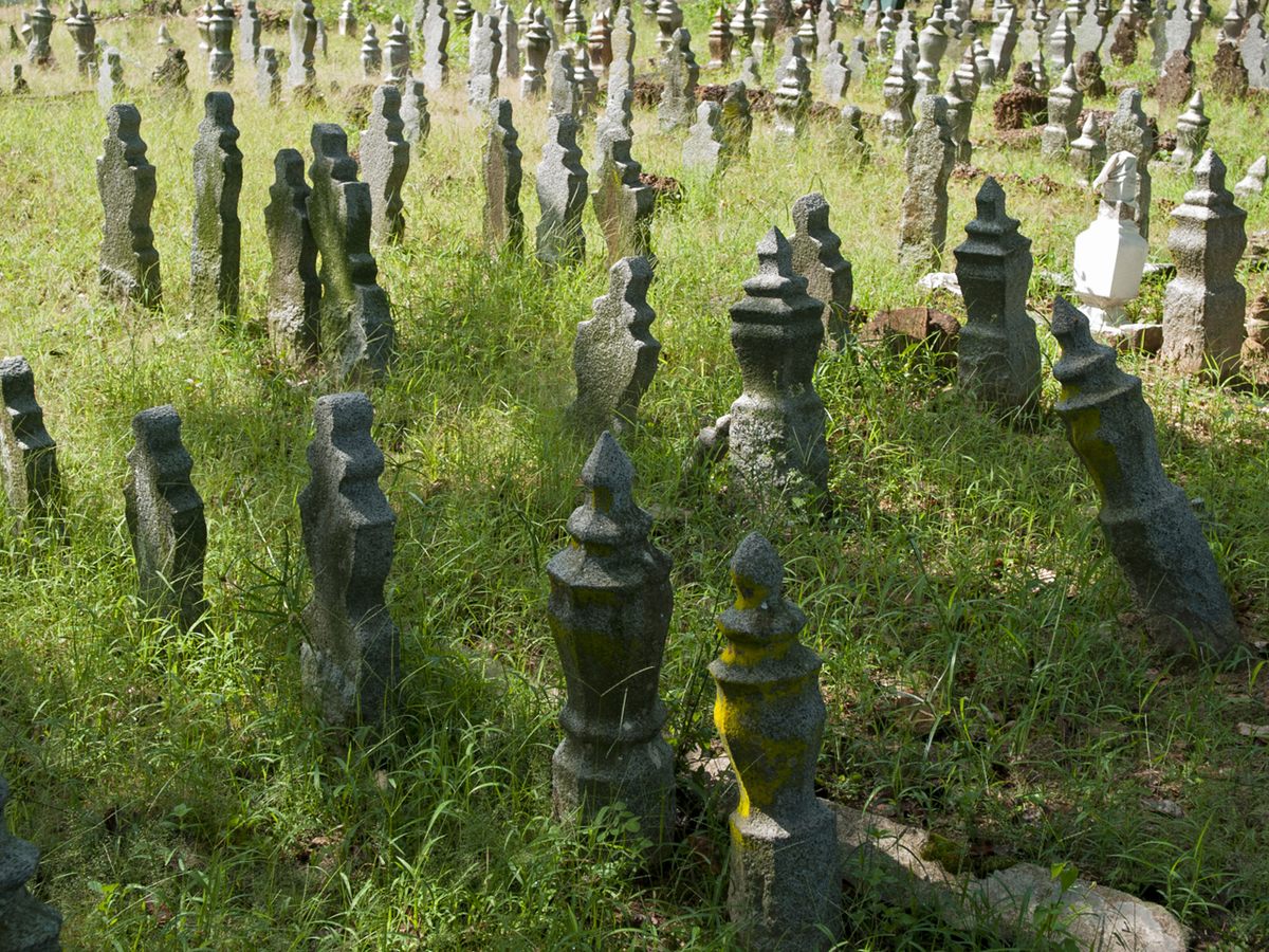 A Muslim graveyard in Malacca, Malaysia. The country's ghost culture coexists with its formal religions.