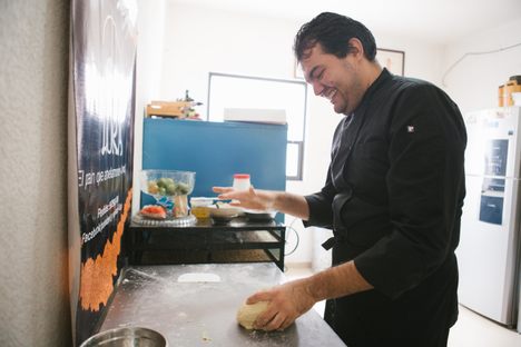 Chef Oliverio prepares pan de muerto. 