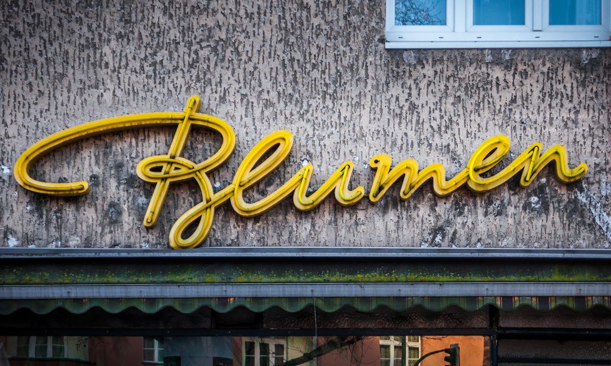 A cursive neon sign for a florist, with a particularly enchanting 'B.'