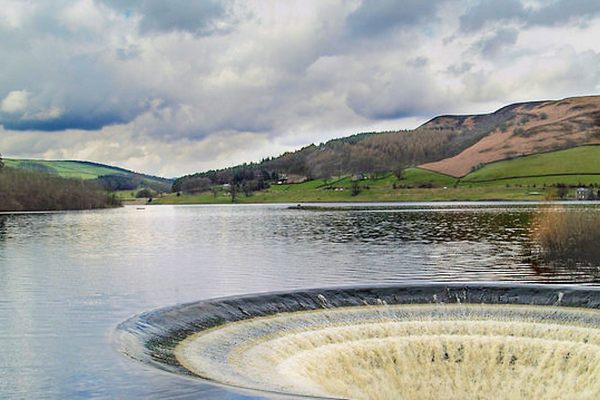 Ladybower Reservoir, the largest of the 3 in the chain, and its hypnotic western overflow.
