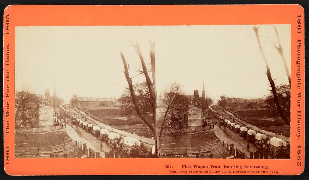 1865. the first Union wagon train entering Petersburg, Virginia, with provisions after the Rebels were forced to evacuate.