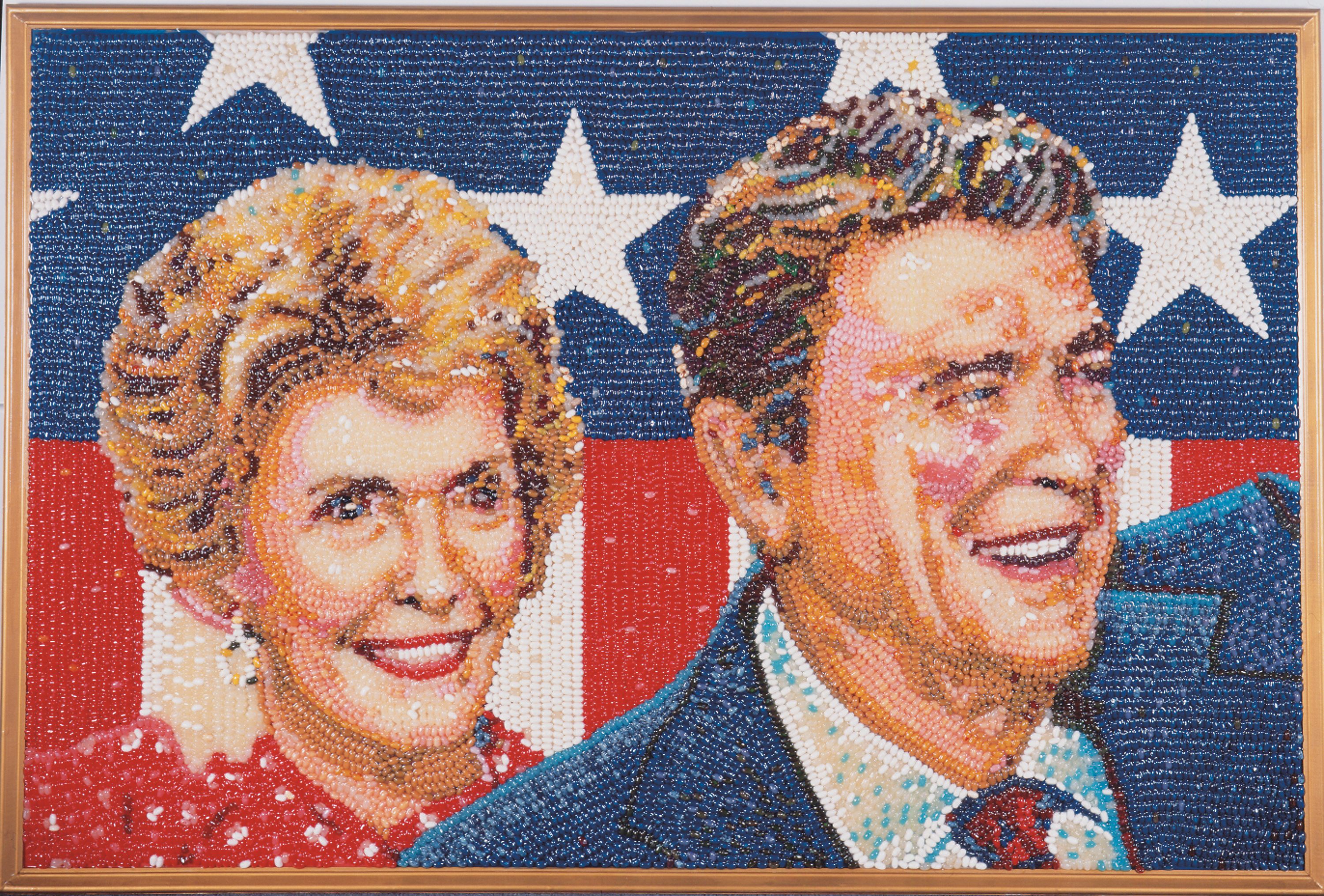 A portrait of Ronald and Nancy Reagan, rendered in beans.