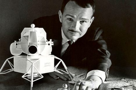 Eugene Shoemaker looking over a lunar lander model of his own making.