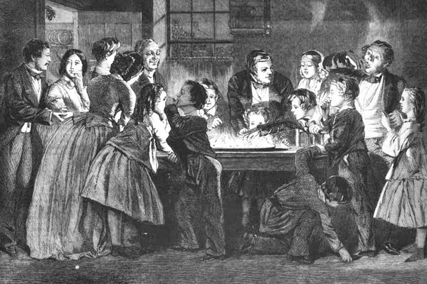 A family plays a game of Snapdragon, from the December 25,1858 issue of the Illustrated London News. 