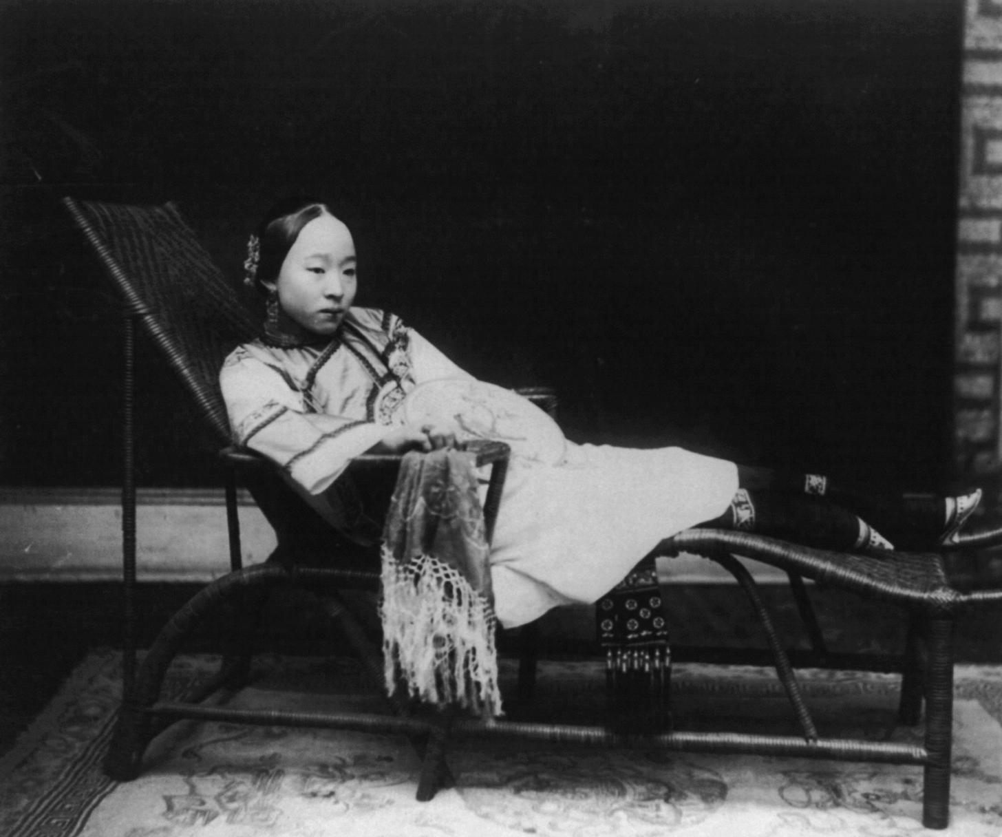 A 19th-century wealthy Chinese woman with bound feet.
