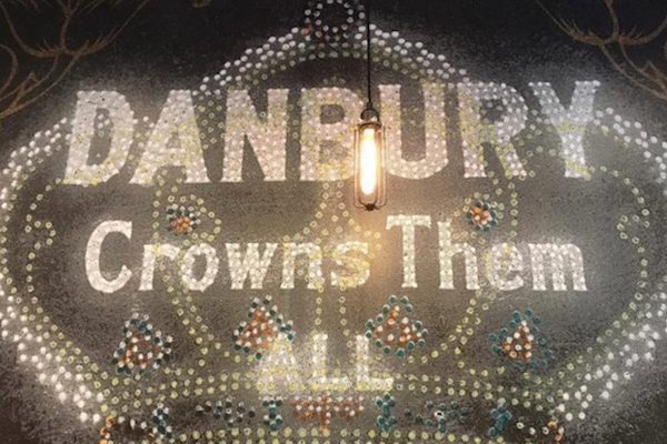 "Danbury Crowns Them All" dominates the cafe's wall.